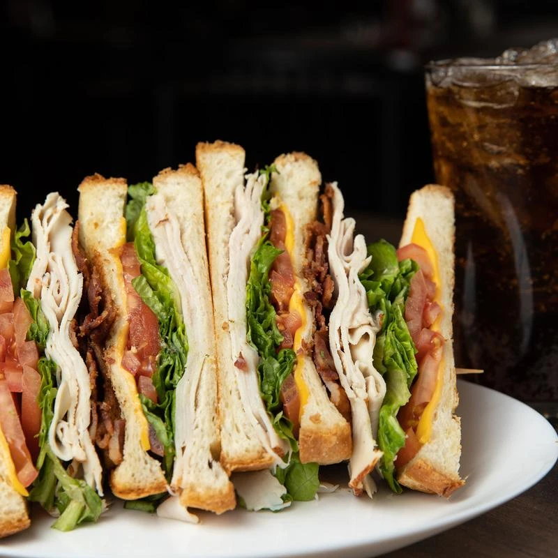 Turkey club sandwich, served