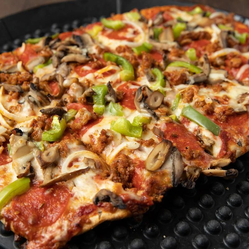 Pizza with sausage, peppers, onions, mushrooms, and cheese