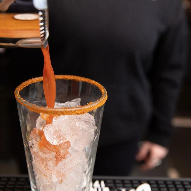 Bloody Mary poured in a glass with ice