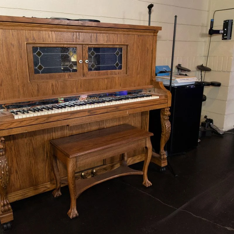 Interior, basement, piano